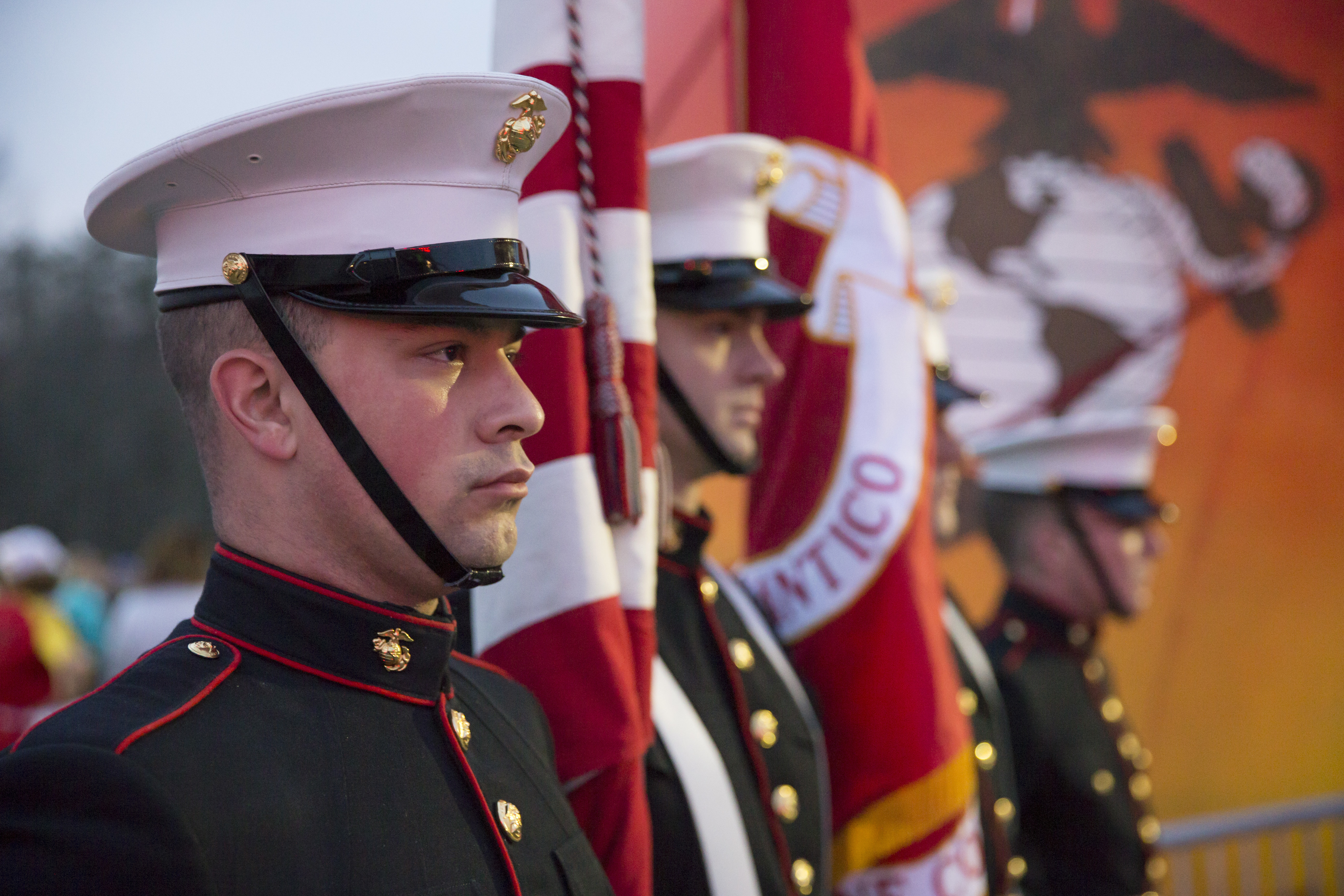 U.S. Marines with the Marine Corps Base Quantico Color Guard stand at attention during the start of the Marine Corps Marathon (MCM) 17.75K at Prince William Forest Park, Va., March 25, 2017. The 17.75K distance commemorates the year the Marine Corps was established and offers guaranteed access to the MCM to the participants who finish in the allotted time.
